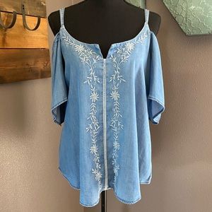 Women’s denim look open shoulder top. Size M.